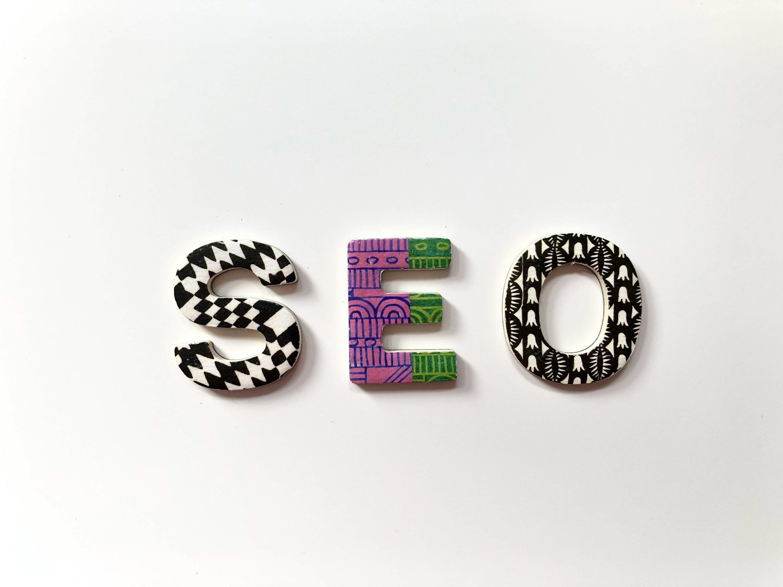 The letters SEO spelled out, illustrating search engine optimization